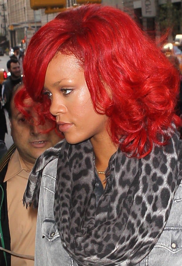 Rihanna looking more than just a little hot in her flaming red hair