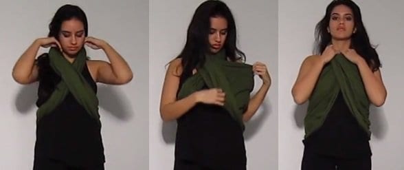 Alexa demonstrates how you can turn the infinity scarf into a halter top