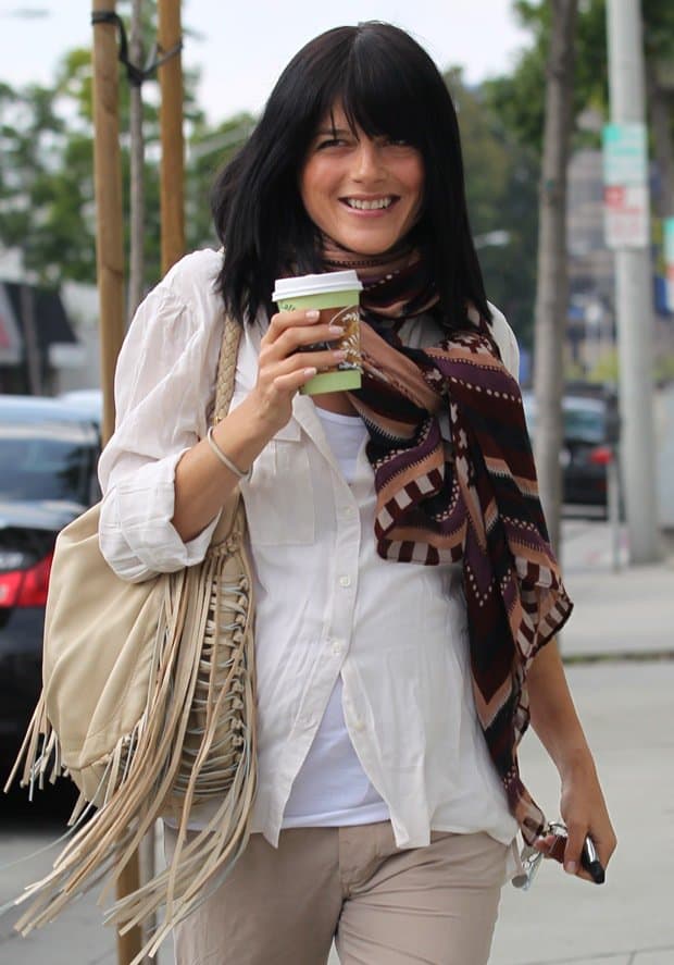 Showing how to wear a safari-inspired multicolored scarf, Selma Blair stops for coffee in West Hollywood