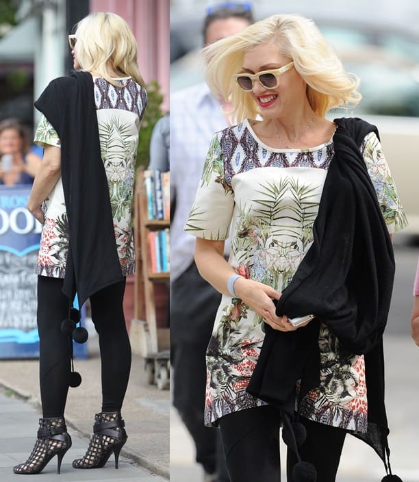 Gwen Stefani rocks a pom-pom trim stole with a printed dress and cage booties while out and about in Primrose Hill, London, on August 19, 2013