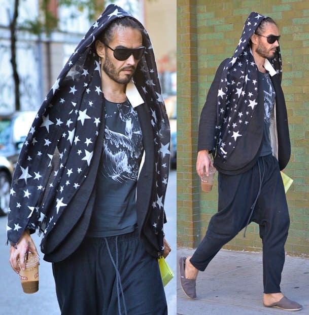 Russell Brand exits a coffee shop in Manhattan while decked in harem pants, a layered jacket, and a star-printed snood, in New York City on September 18, 2013