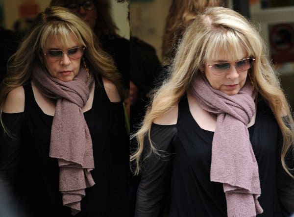 Stevie Nicks wears a thick, rose pink scarf at the BBC on September 13, 2013, in London, England