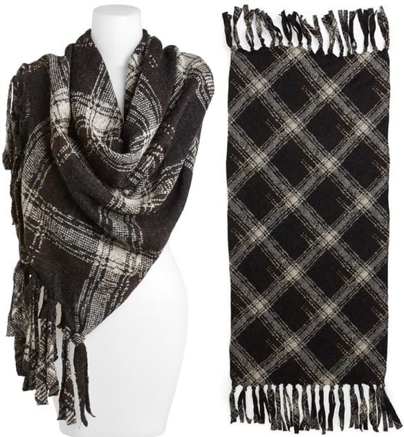 Wide fringe brings a homespun feel to a classic plaid wrap crafted in Italy