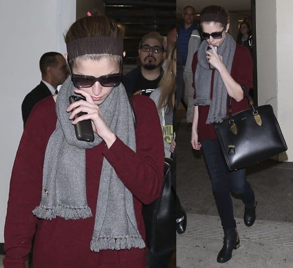 Anna Kendrick makes her way through LAX in a maroon jumper paired with a grey scarf