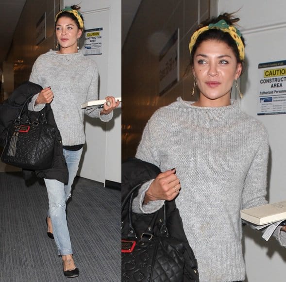 Jessica Szohr, with a bright yellow printed headscarf, arrives at LAX to catch a flight