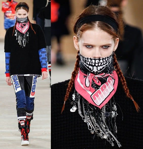Channeling the bandits, models walk down the MBMJ runway with printed scarves covering their mouths