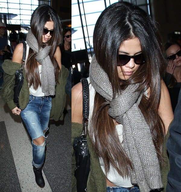 Selena Gomez looks extra cool in ripped jeans and a cropped top