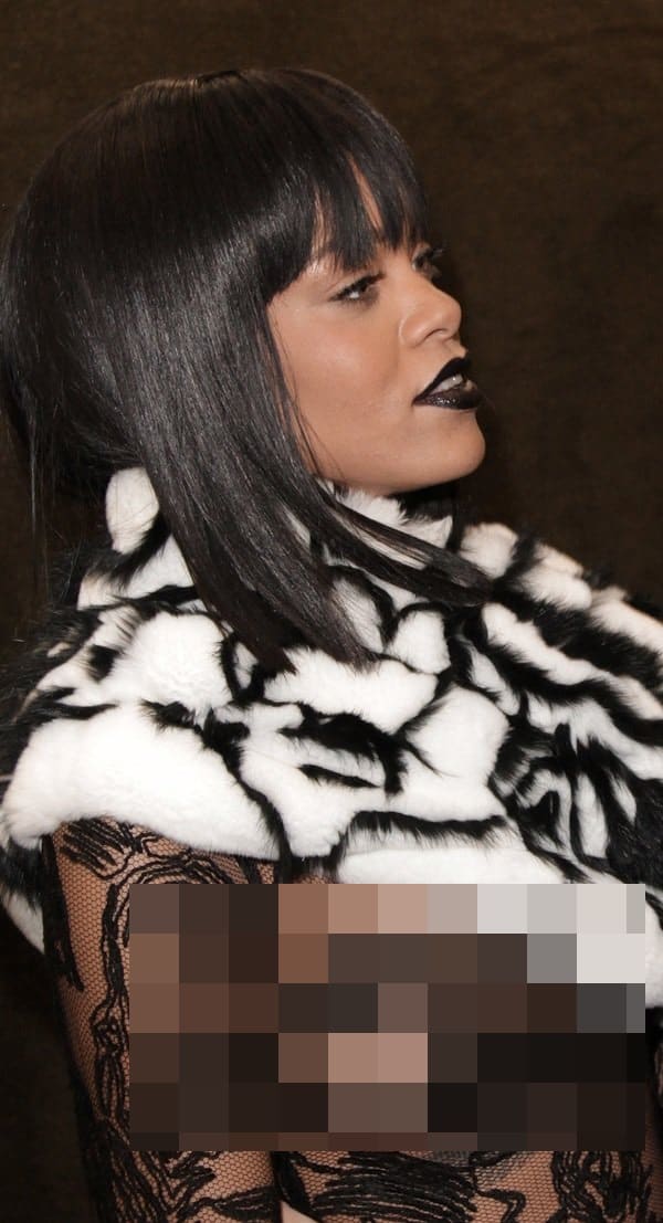Rihanna bares a breast in a sheer Jean Paul Gaultier creation