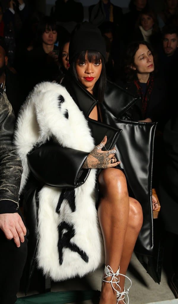 Rihanna wearing a furry piece at the Comme des Garcons show