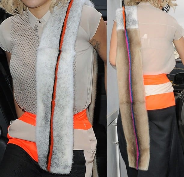 Rita Ora's fur scarf and buttoned-up blouse