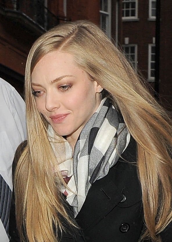 Amanda Seyfried styled her patterned scarf with a structured coat