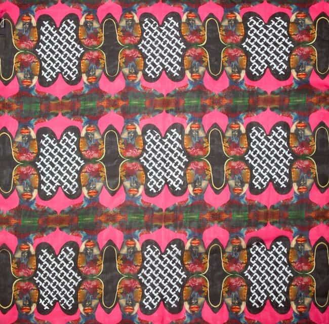 This vibrant silk scarf merges Diane von Furstenberg's signature chain-link pattern with an exclusive Born Free print, designed by Kenyan artist Wangechi Mutu