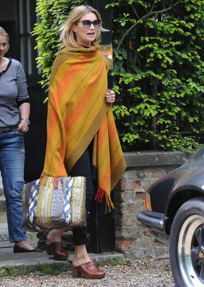 Kate Moss is seen carrying a stylish Balenciaga multi-color Elaphe A4 Papier tote bag