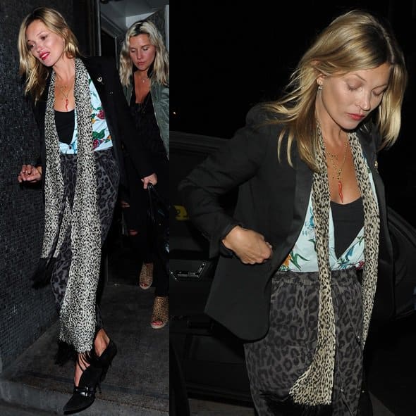 Kate Moss added a sophisticated touch by topping off the outfit with a classic black jacket and an animal-print scarf