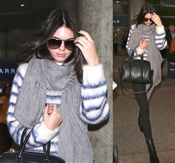 Kendall Jenner arrives at LAX decked in a fuzzy, striped sweater and fringed gray scarf