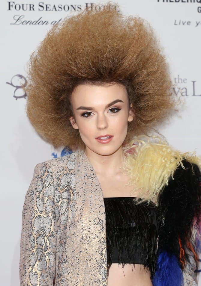 Tallia Storm overdoses herself on the fringes as she wears multiple statement pieces in one go at the Global Gift Gala