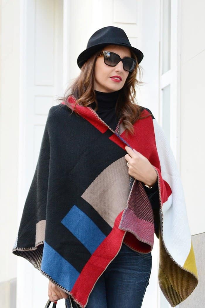 Silvia styled her color-block wrap with classy sunglasses